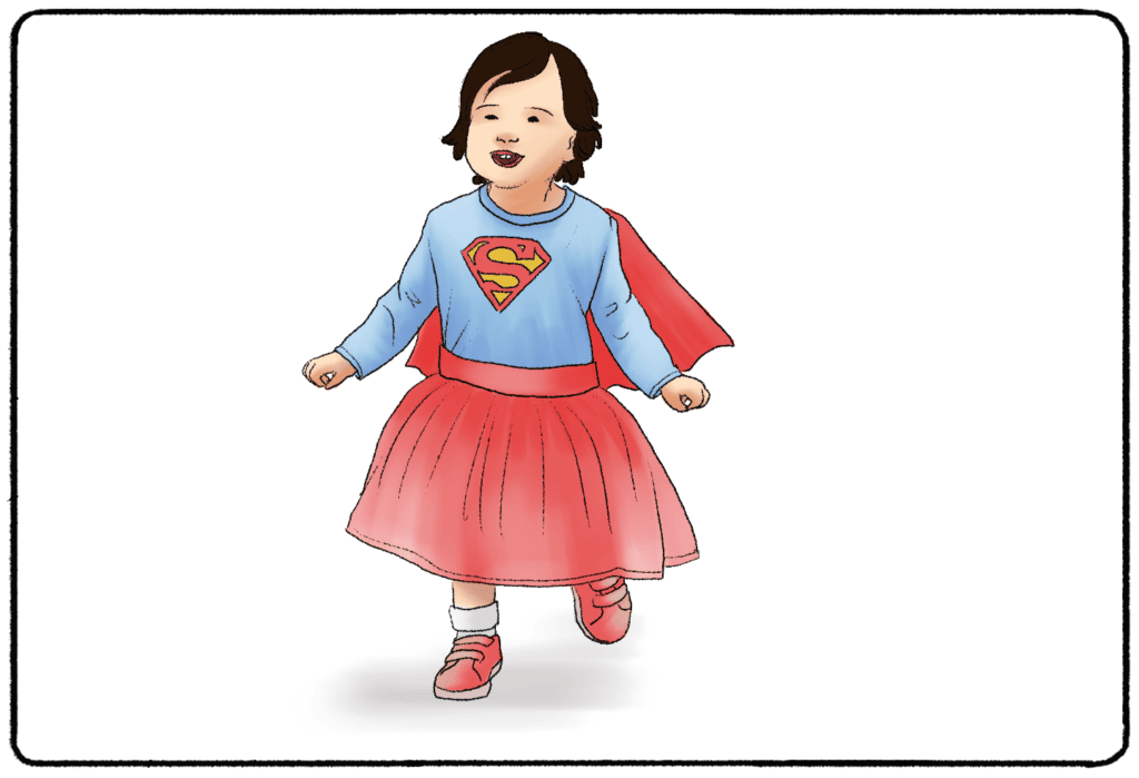 a child in a superman shirt and skirt
