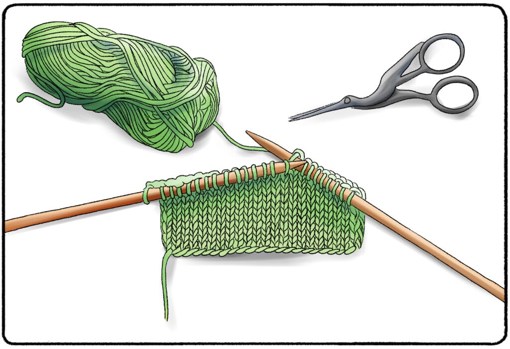 a skein of yarn being knitted next to scissors